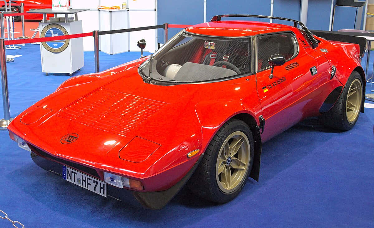 Classic Red Lancia Stratos Exhibition Wallpaper