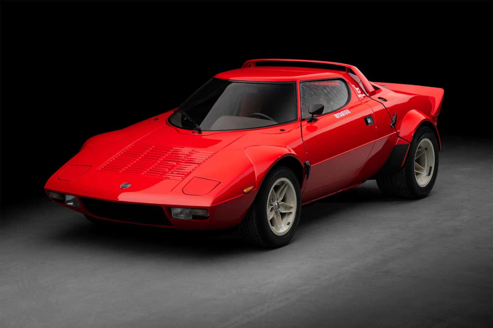 Classic Red Lancia Stratos Side View Wallpaper