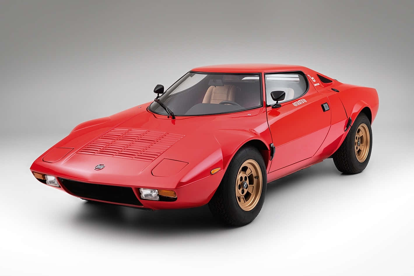 Classic Red Lancia Stratos Side View Wallpaper