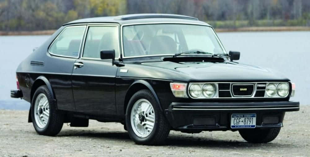 Classic Saab 99 In Sunny Outdoors Wallpaper