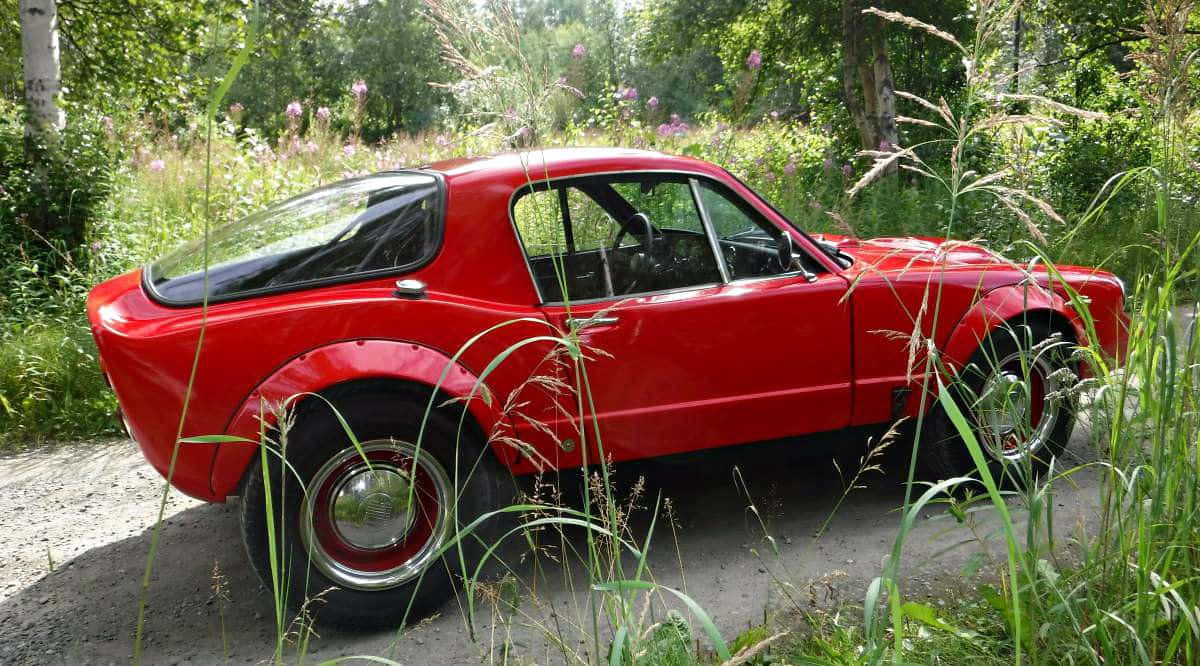 Classic Saab Sonett In Vibrant Orange Wallpaper