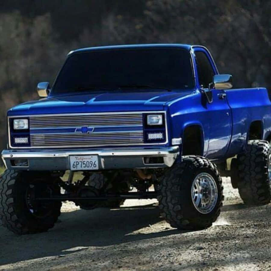 Classic Square Body Truck In The Countryside Wallpaper