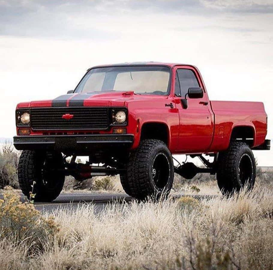 Classic Square Body Truck On A Country Road Wallpaper