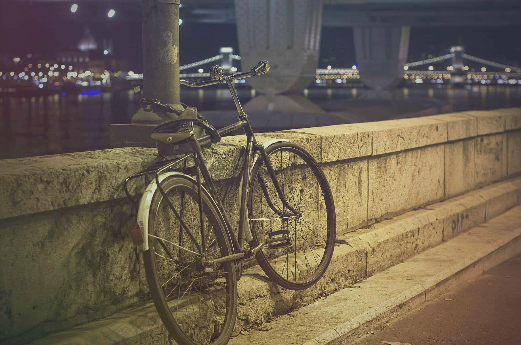 Classic Vintage Bicycle Against A Brick Wall Wallpaper