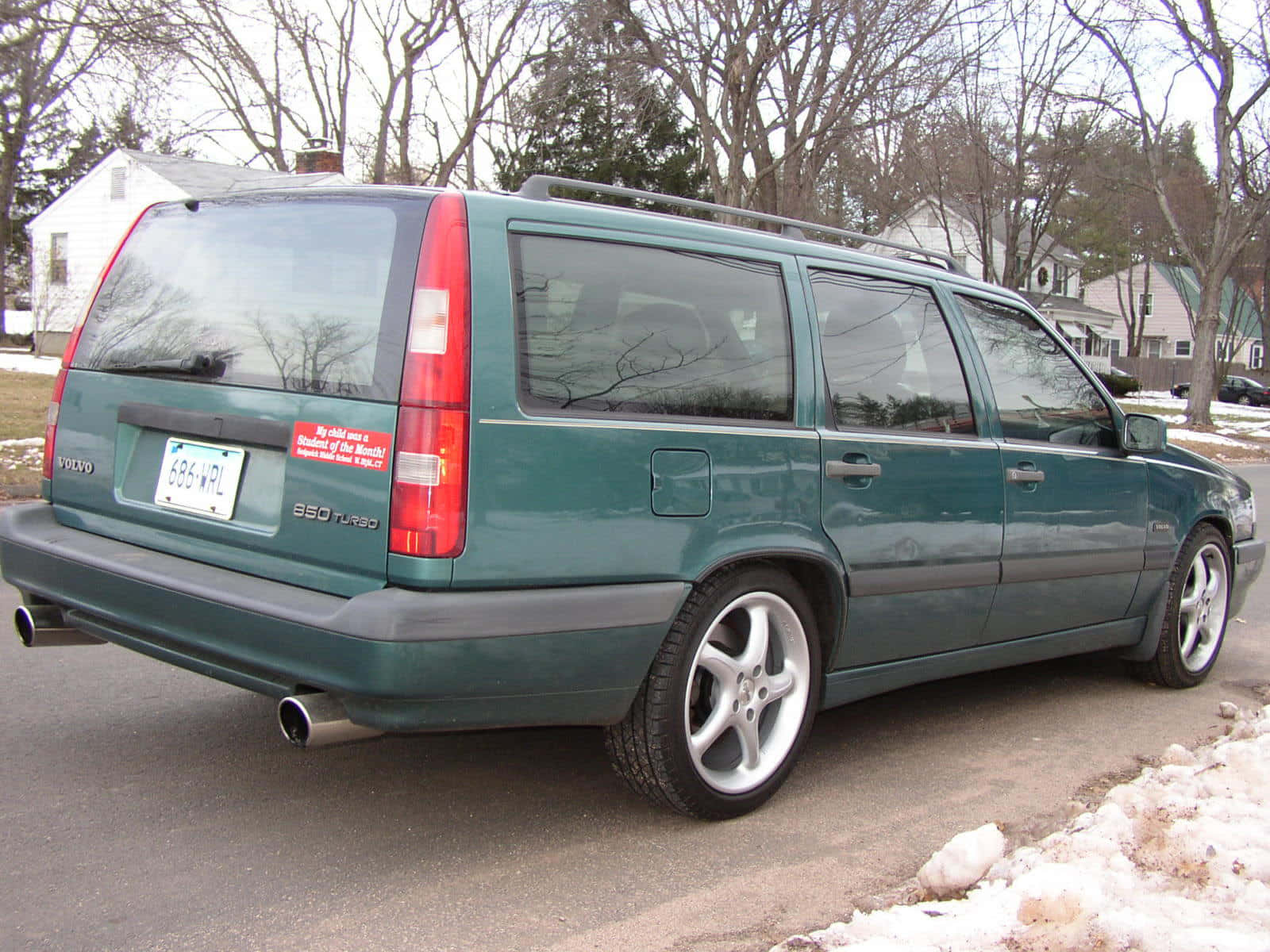 Classic Volvo 850 Sedan On Road Wallpaper