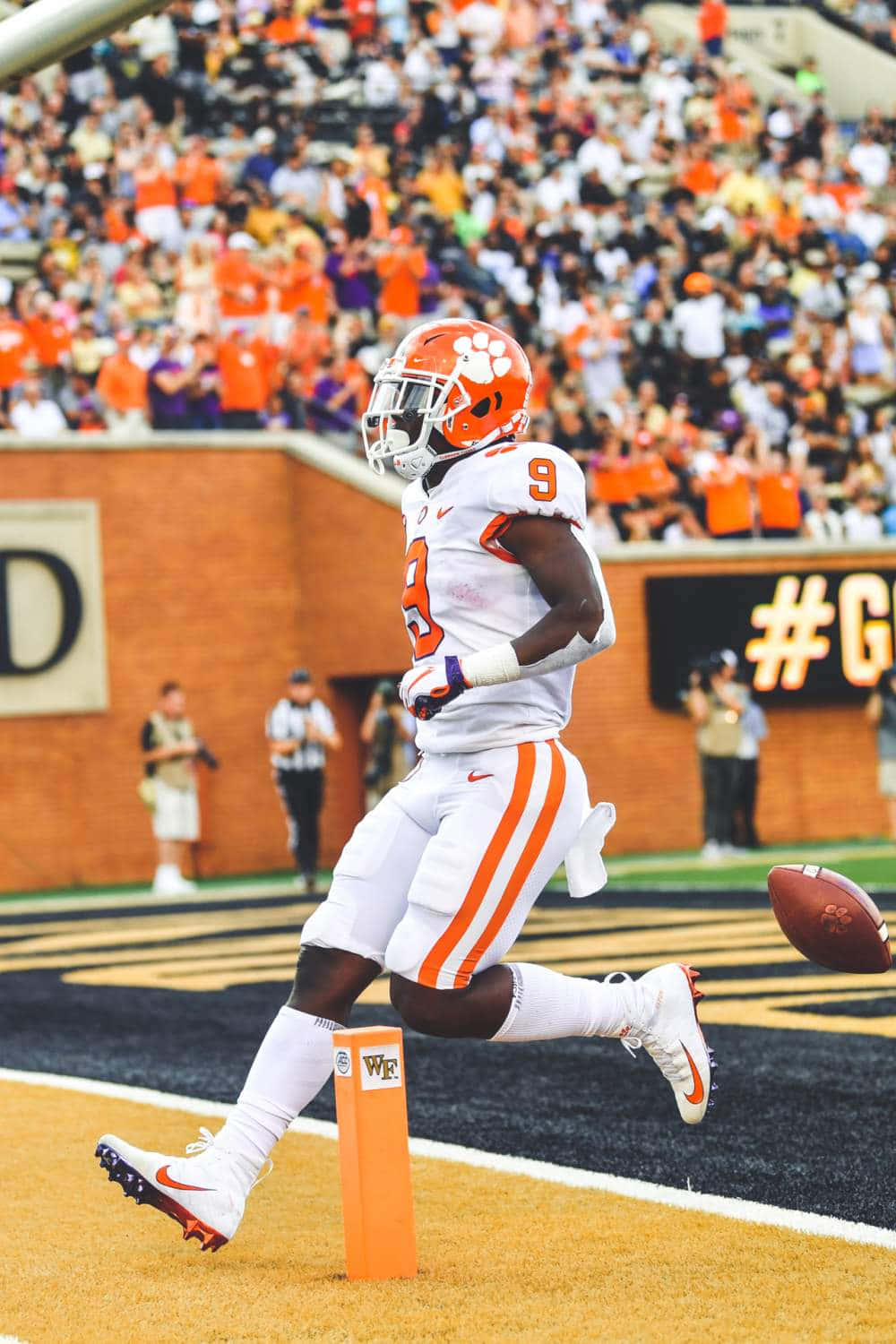 Clemson Football Player Touchdown Celebration Wallpaper