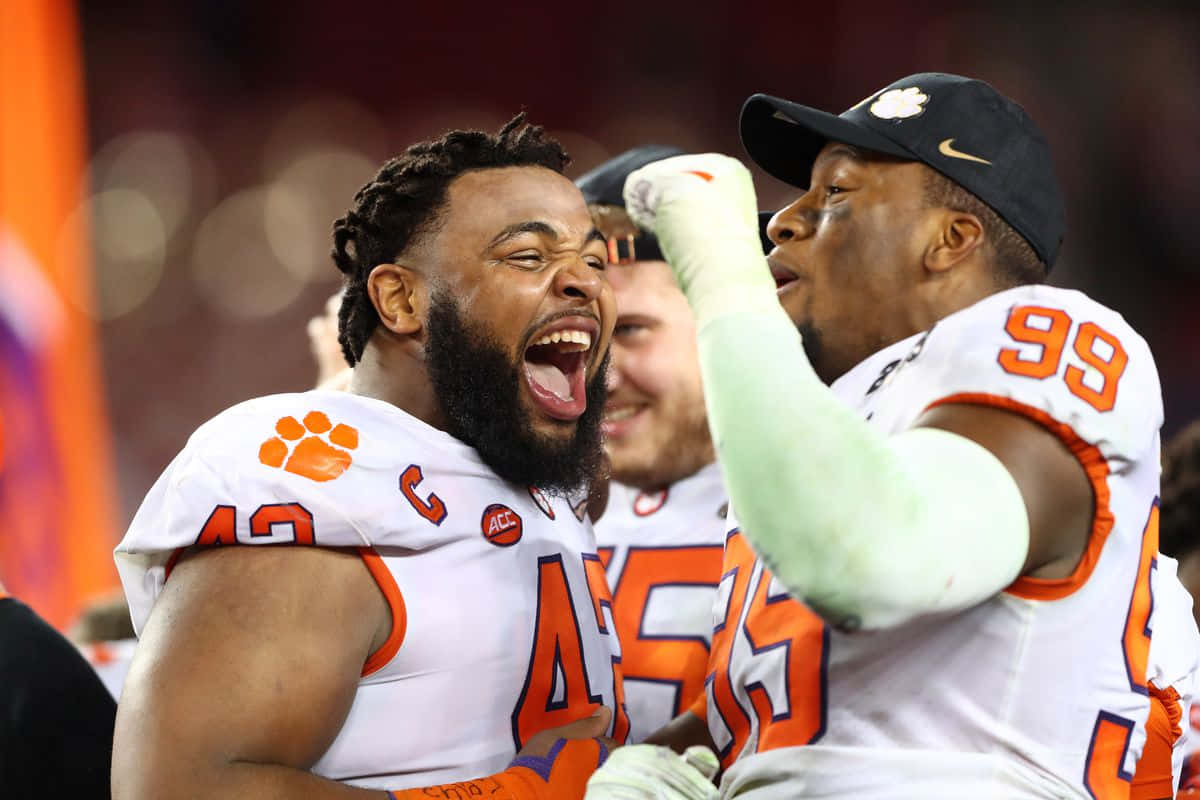 Clemson Players Celebrating Victory Wallpaper