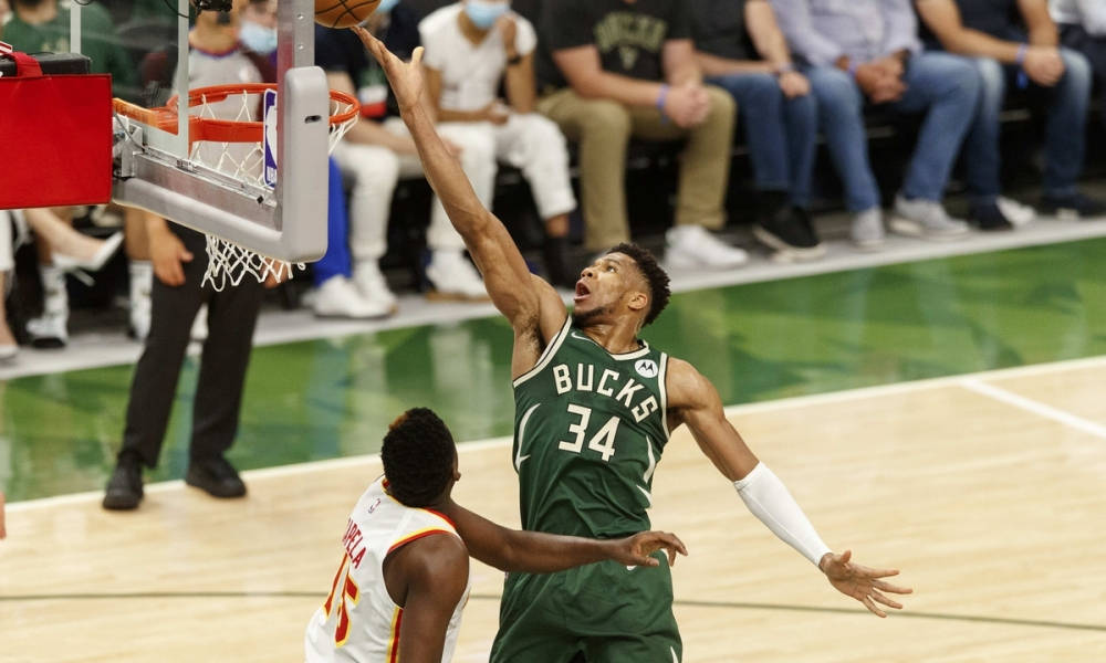 Clint Capela Watches Opponent To Score Wallpaper