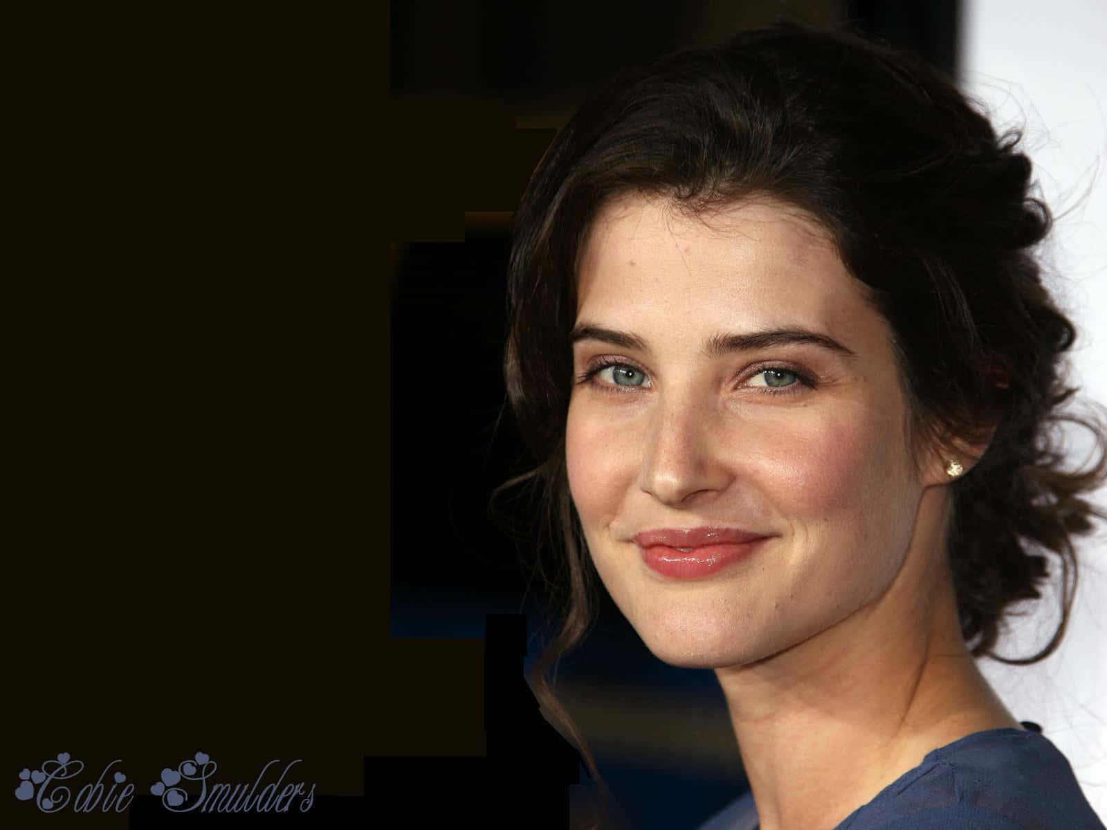 Cobie Smulders Radiates Natural Beauty In A Stunning Close-up Portrait. Wallpaper