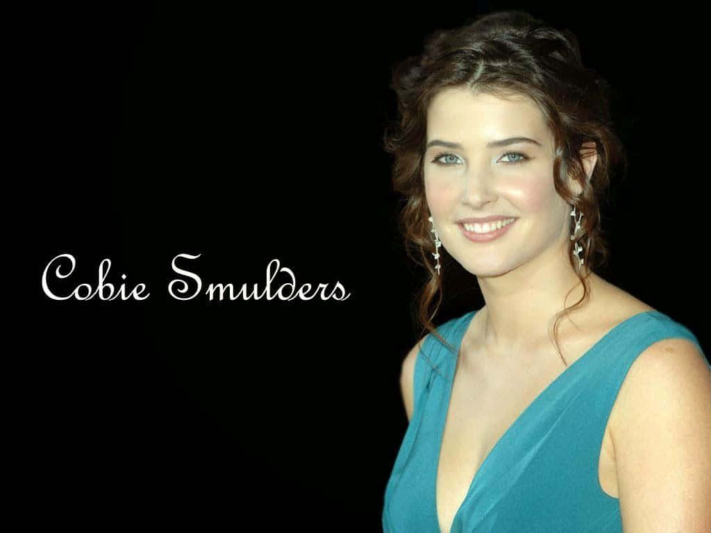 Cobie Smulders Striking A Pose In A Radiant Photoshoot Wallpaper