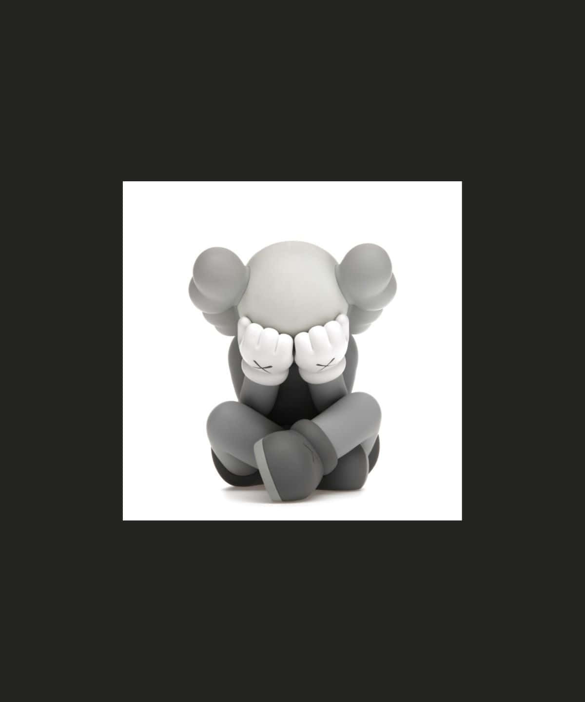 Collection Of Kaws Figures Displayed On Shelf Wallpaper