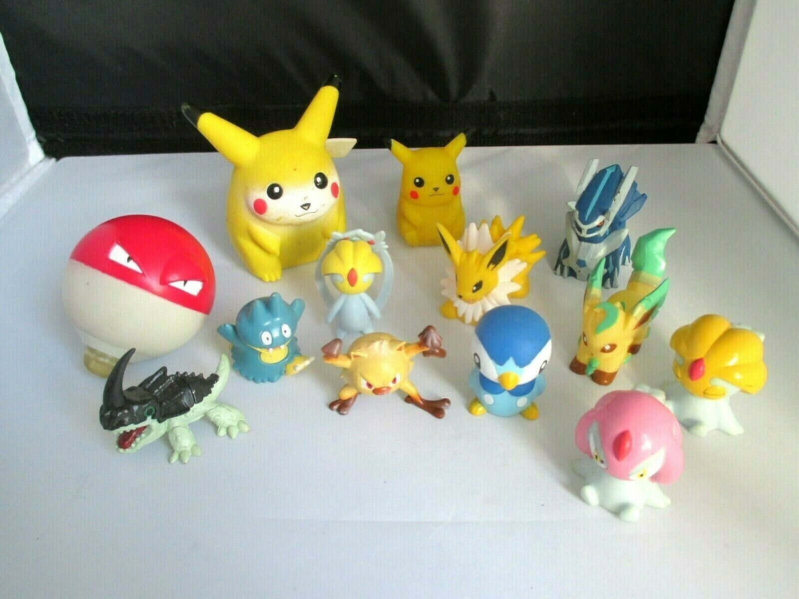 Colorful Array Of Pokemon Toys Wallpaper