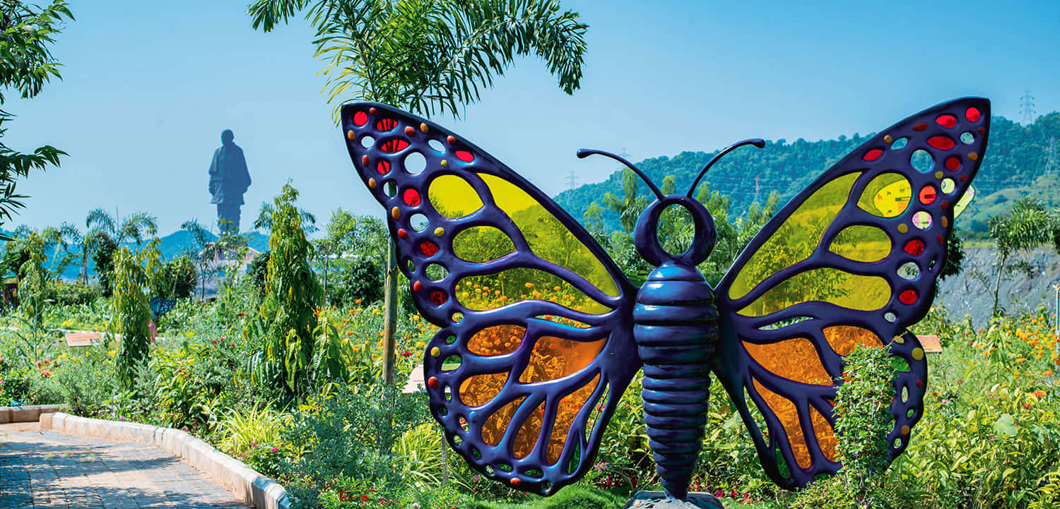 Colorful_ Butterfly_ Sculpture_at_ Park Wallpaper