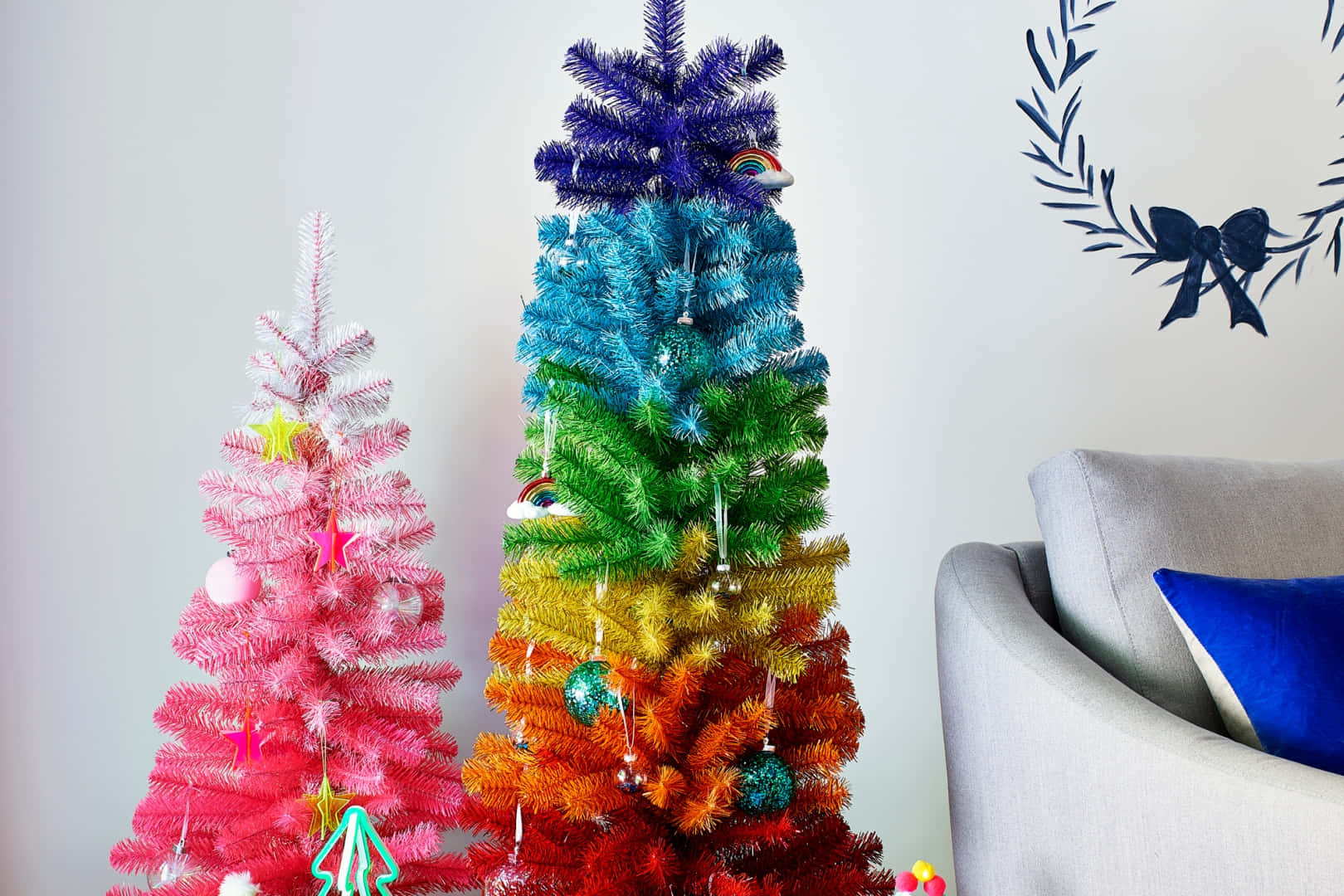 Colorful Christmas Trees Display Wallpaper