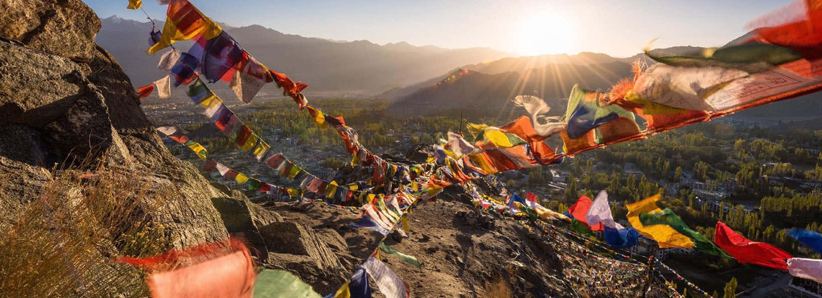 Colorful Flags Hanging In Lhasa Wallpaper