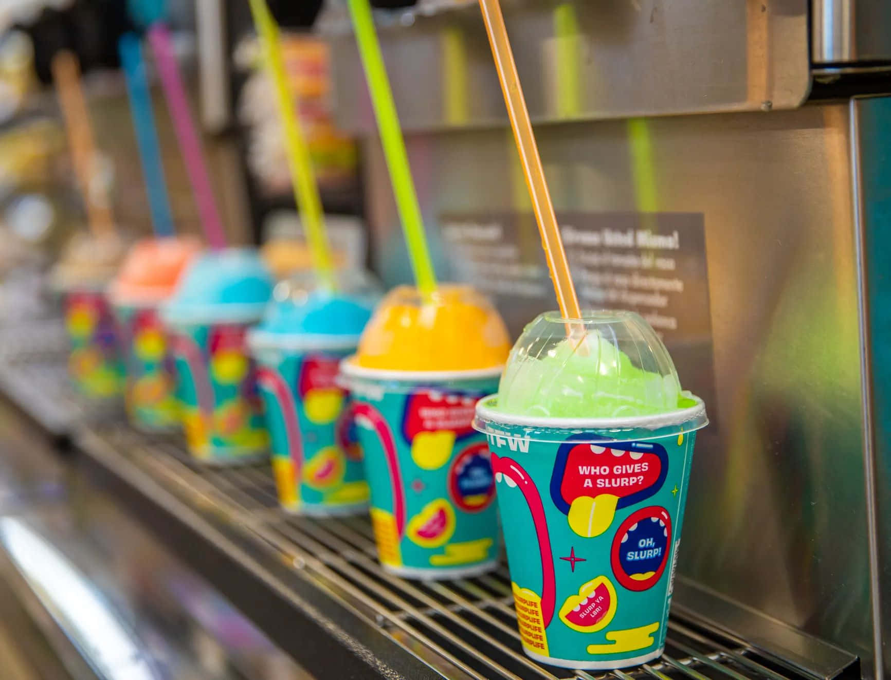 Colorful Slurpee Cupsin Row Wallpaper