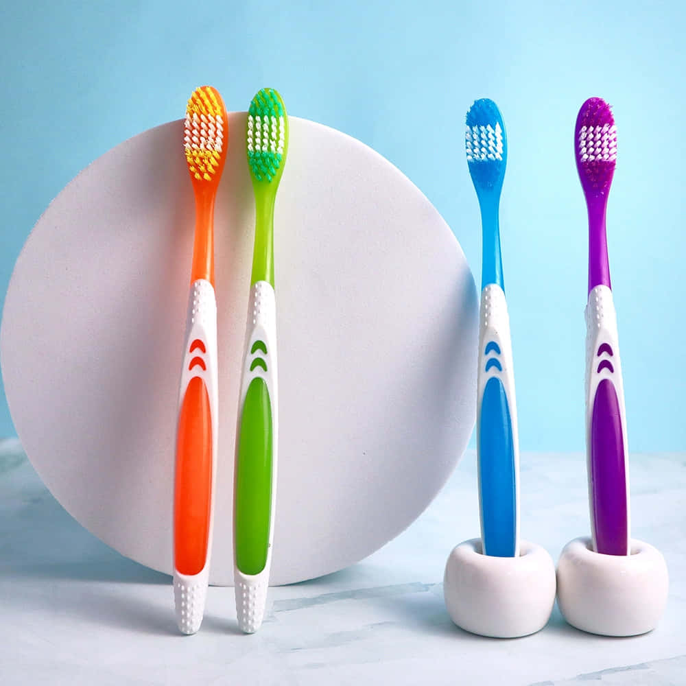 Colorful Toothbrushes Standing Wallpaper