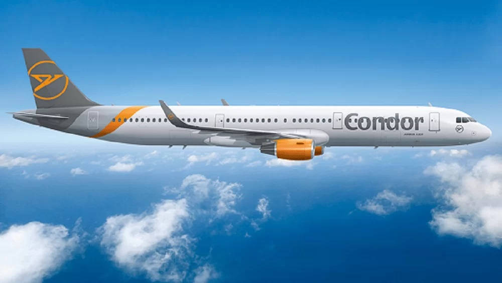 Condor Airlines Aircraft Ascending In Cloudy Blue Sky Wallpaper