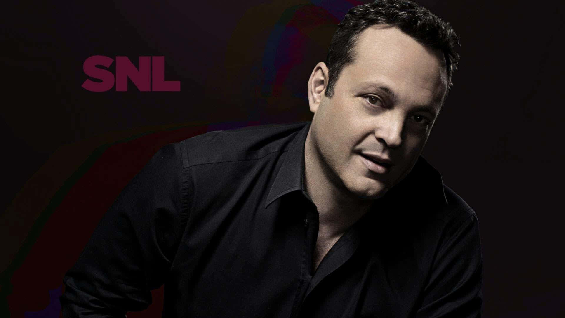 Confident Vince Vaughn Posing For A Photoshoot Wallpaper