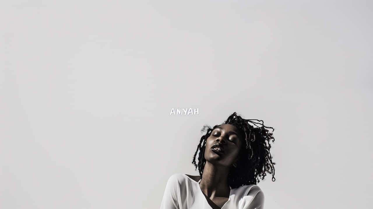 Contemplative Aniyah Portrait Wallpaper