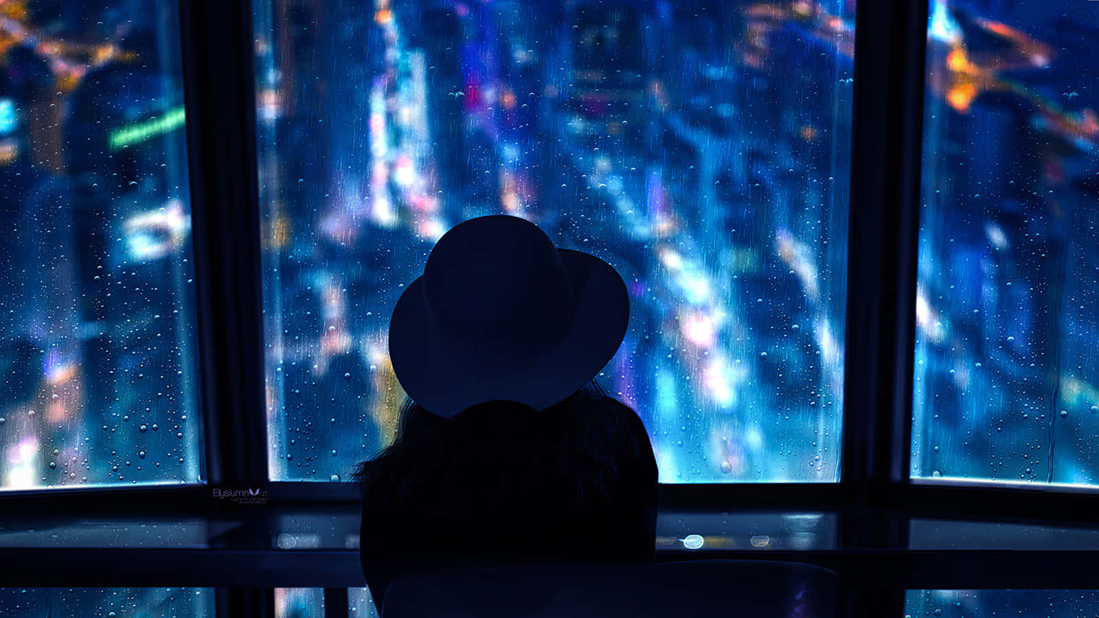 Contemplative Silhouette Against Night Sky Wallpaper