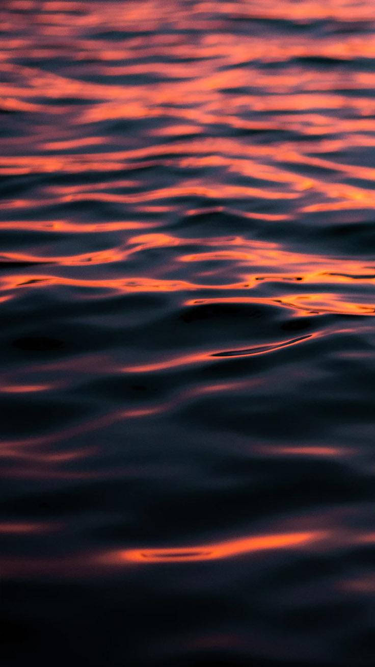 Cool Iphone Xs Max Orange Ocean Surface Wallpaper