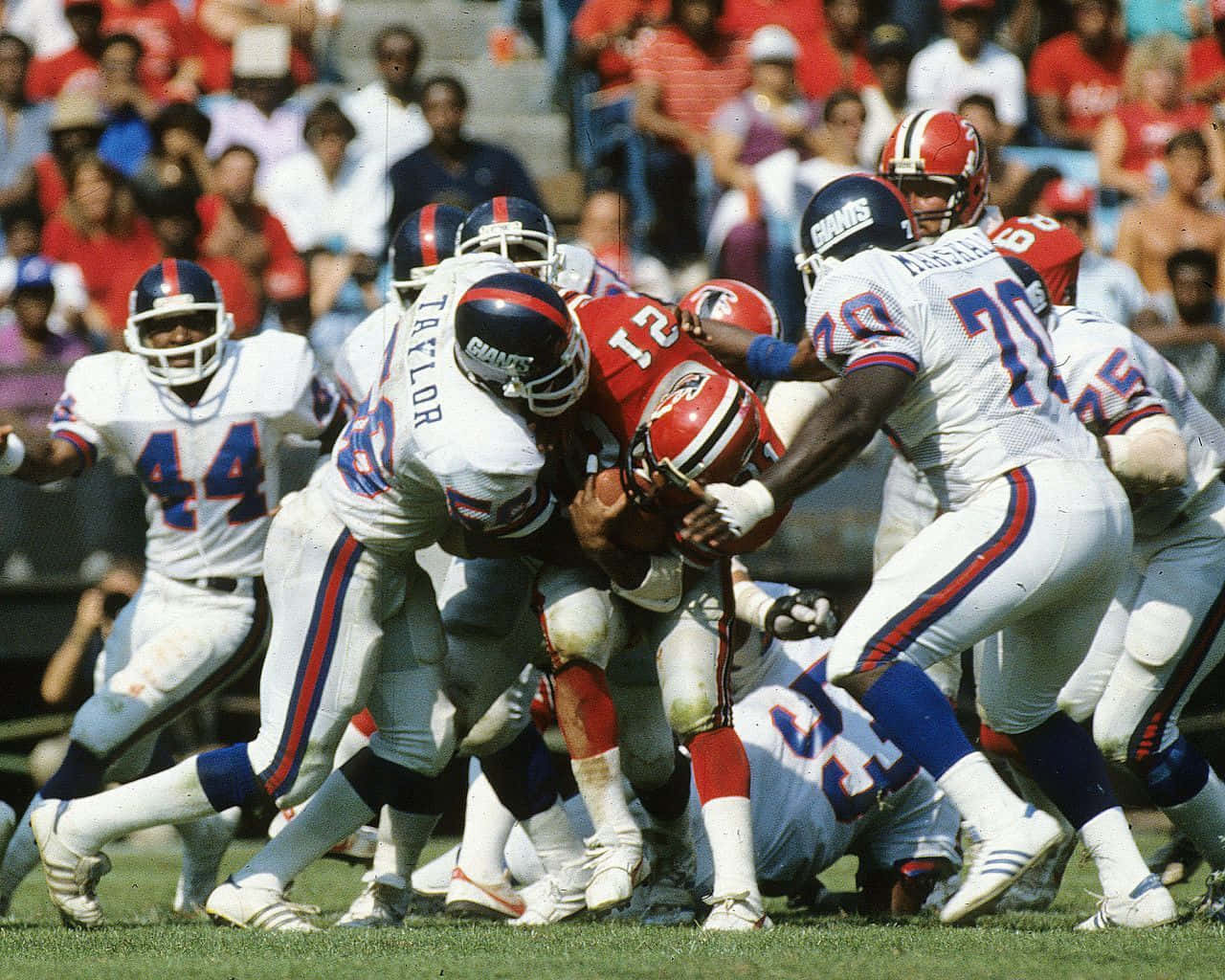 Cool Lawrence Taylor Football Tackle Wallpaper