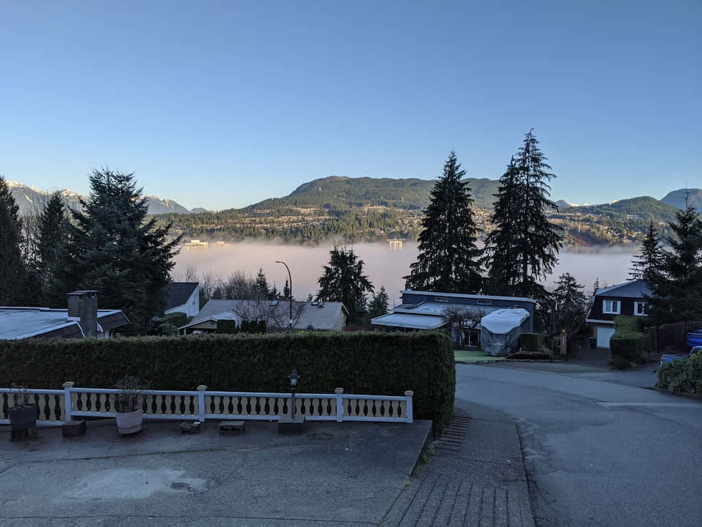 Coquitlam Morning Mist Over Lake Wallpaper