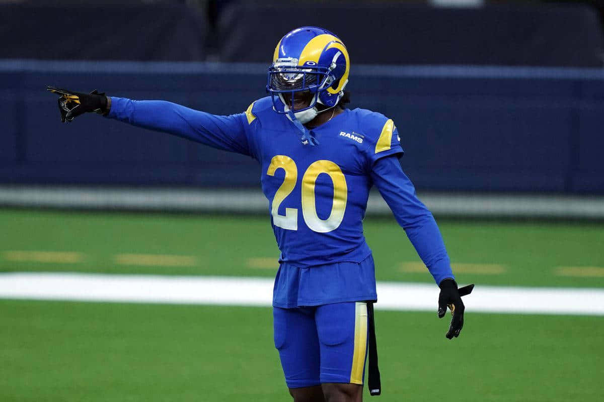 Cornerback In Action Rams Uniform Wallpaper