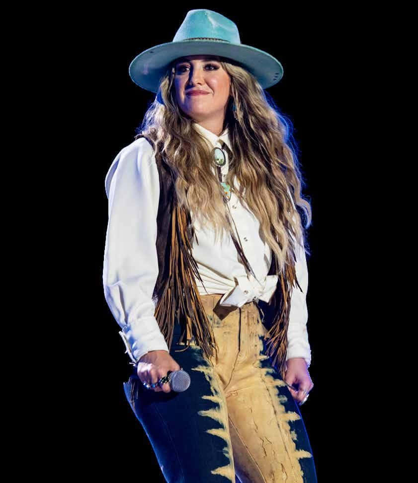 Country Music Performerin Stage Outfit Wallpaper