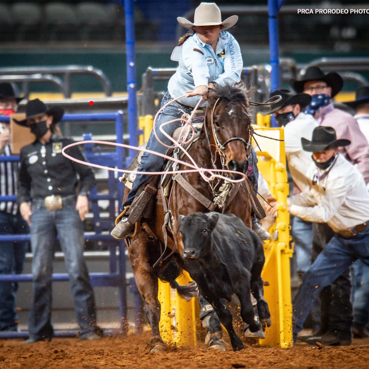 Cowboys In Action During Team Roping Wallpaper