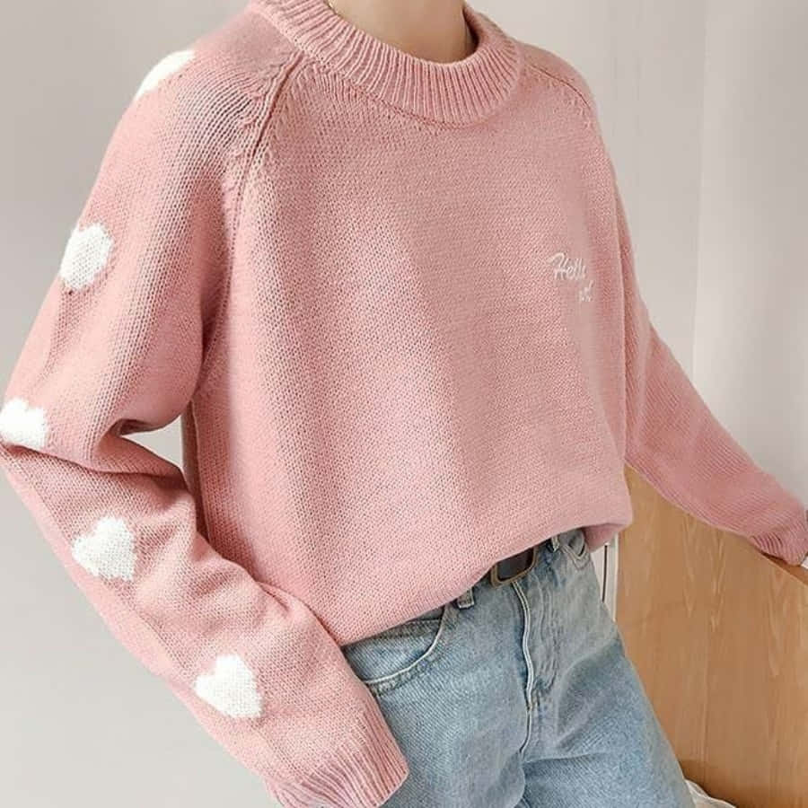 Cozy And Stylish Pink Sweater Wallpaper