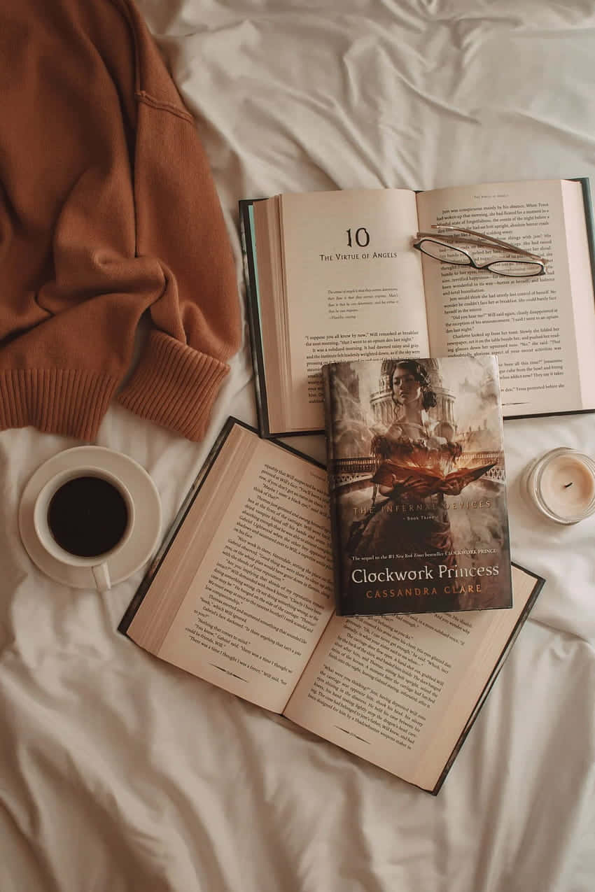 Cozy_ Reading_ Time_with_ Coffee_and_ Sweater Wallpaper