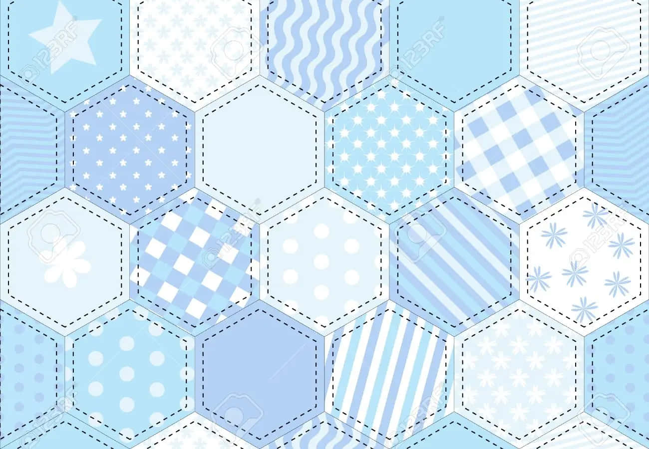 Cozy Up With This Blue & White Quilt Wallpaper