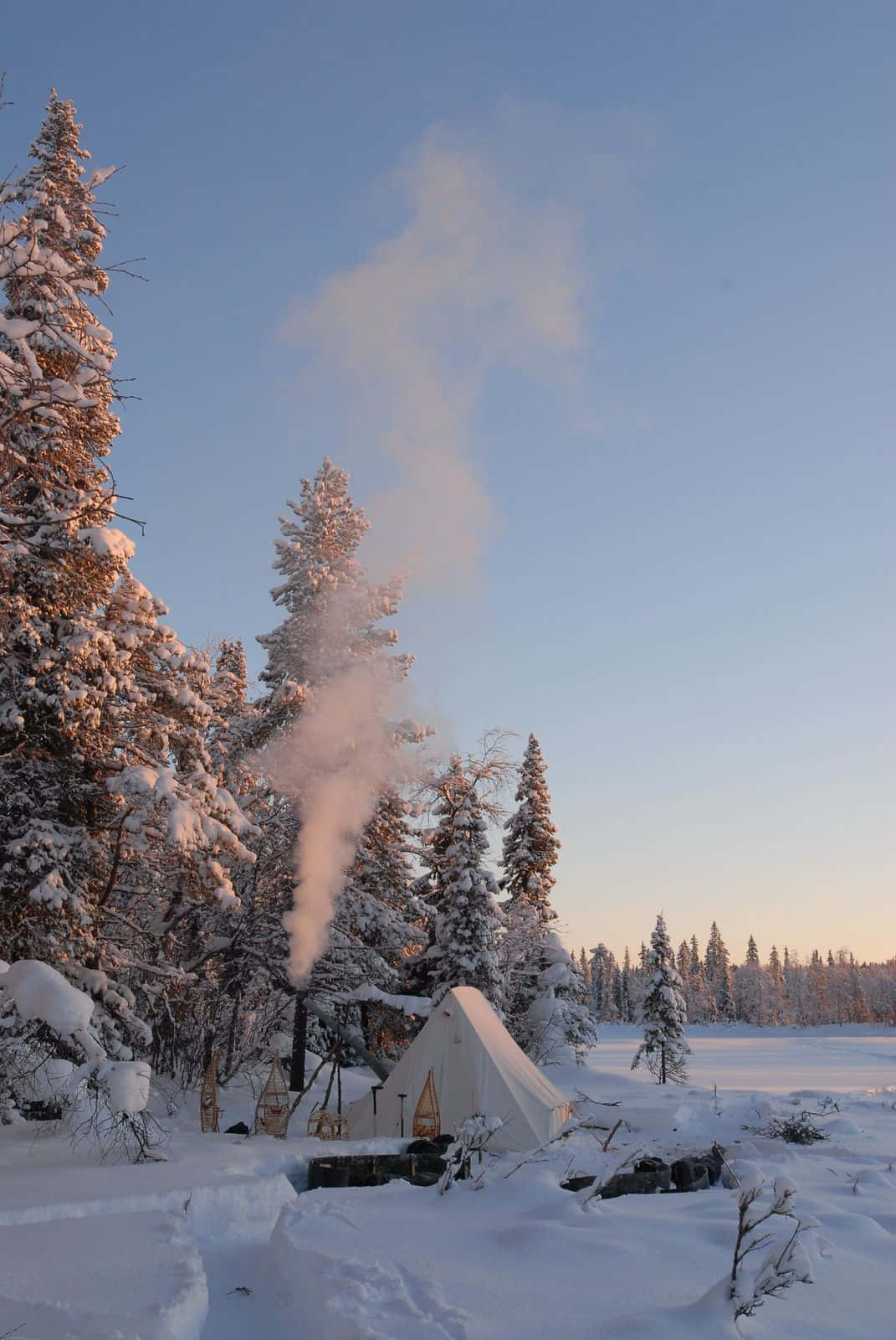 Cozy Winter Camping At Snowy Campsite Wallpaper