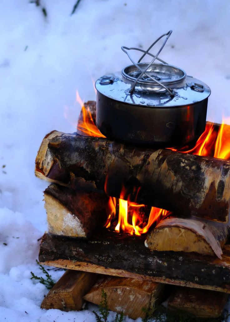 Cozy Winter Camping In Snow Wallpaper