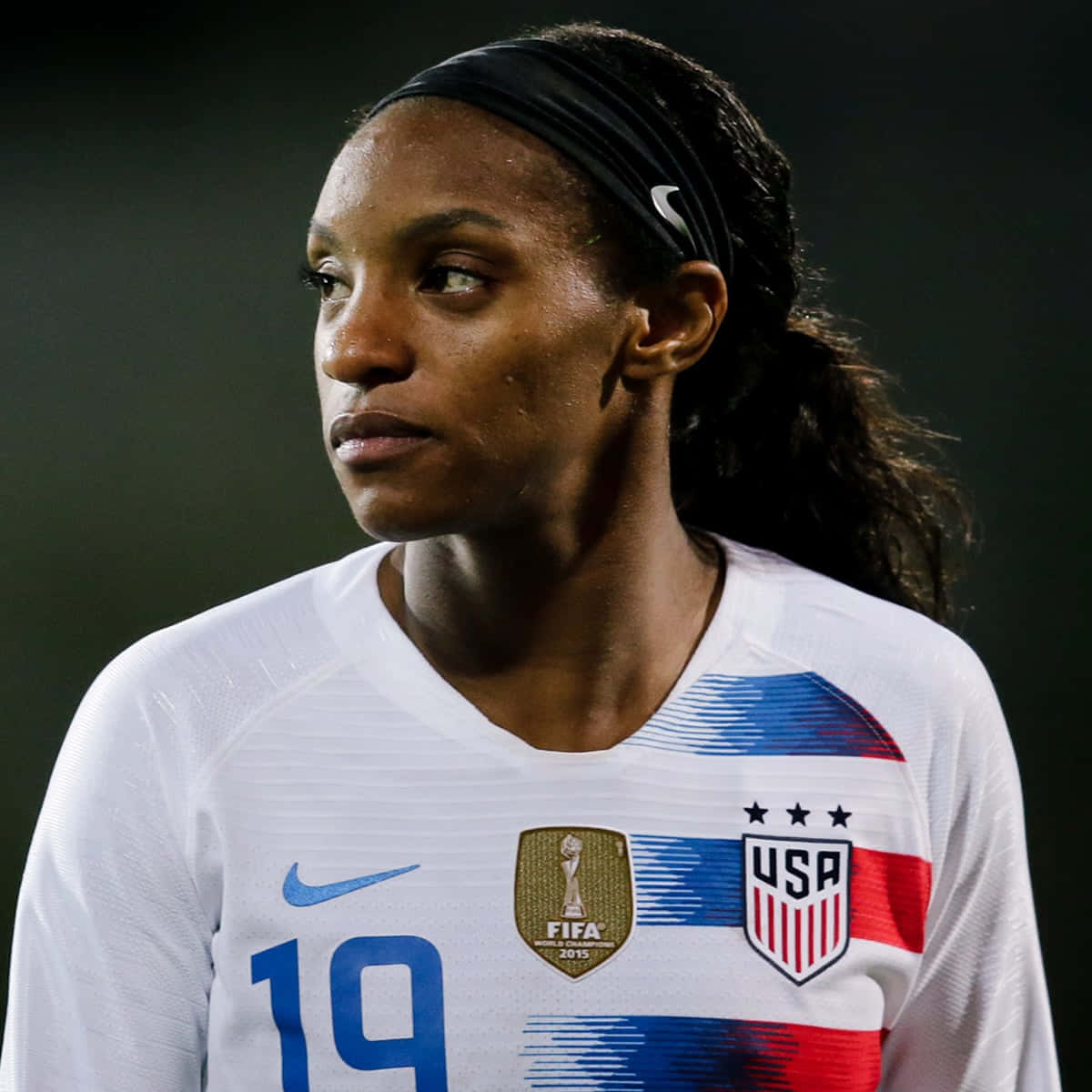 Crystal Dunn Driving The Ball For Team Usa Wallpaper