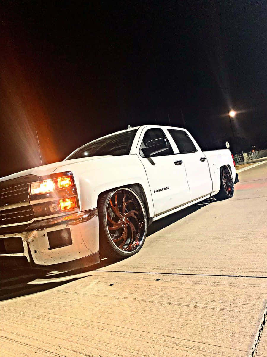 Customized White Silverado Night Scene Wallpaper