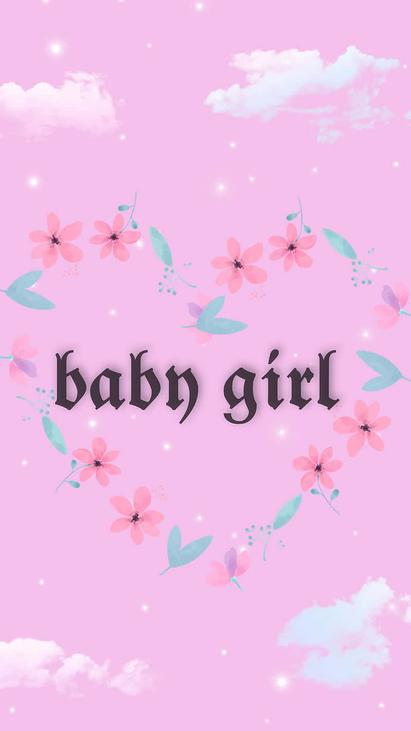 Cute Baby Girl Wrapped In A Soft Pink Blanket Wallpaper