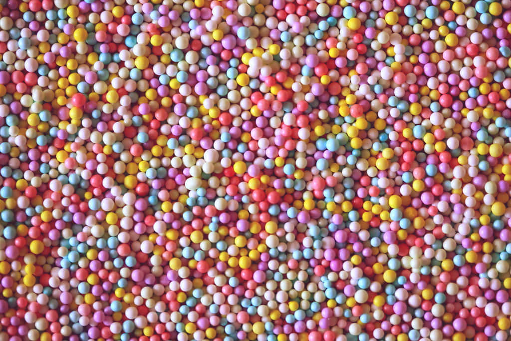 Cute Candy Balls Piled Together Wallpaper