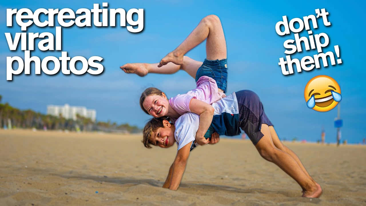 Cute Gymnastics Moves On The Beach Wallpaper