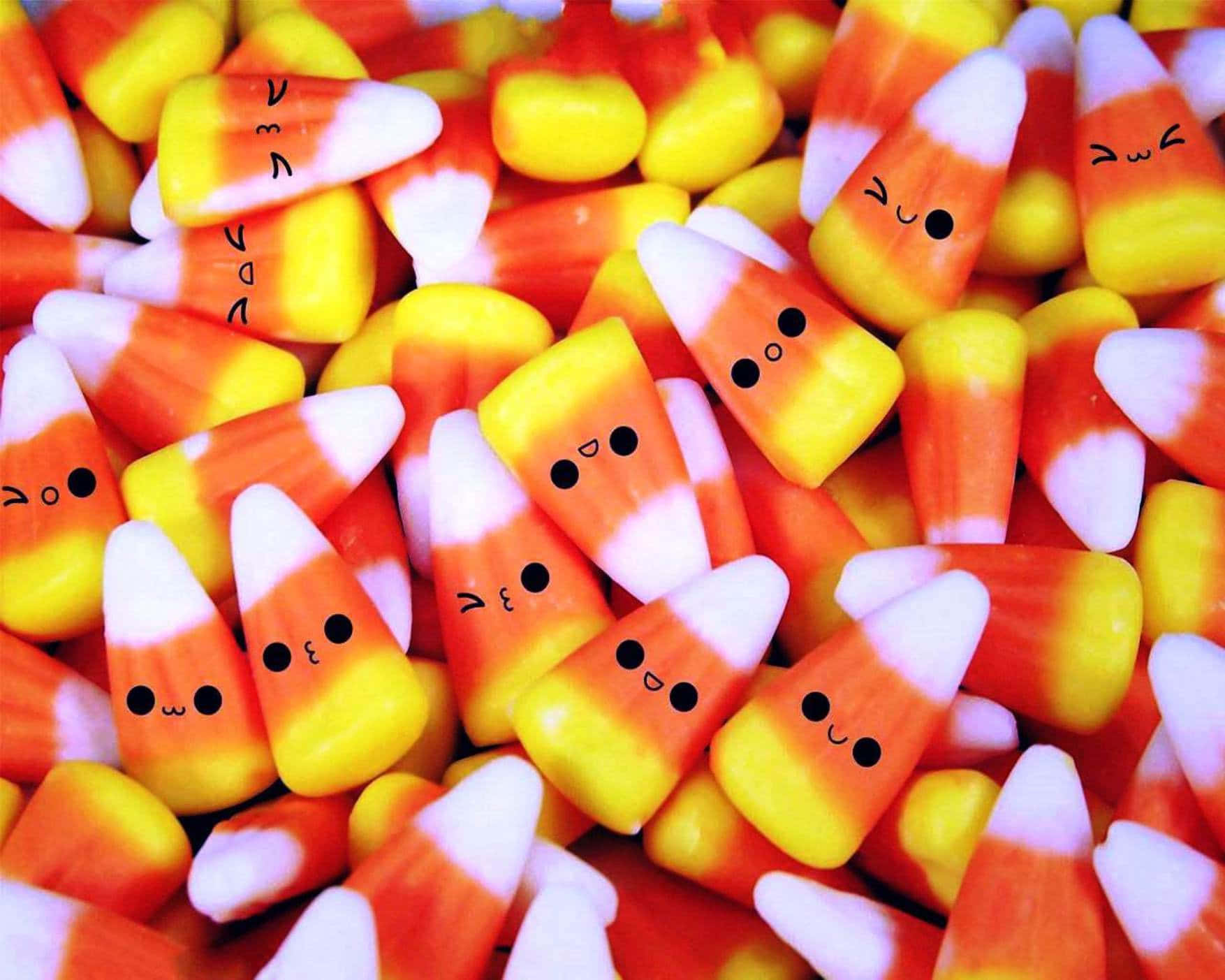 Cute Halloween Triangular Candies Wallpaper