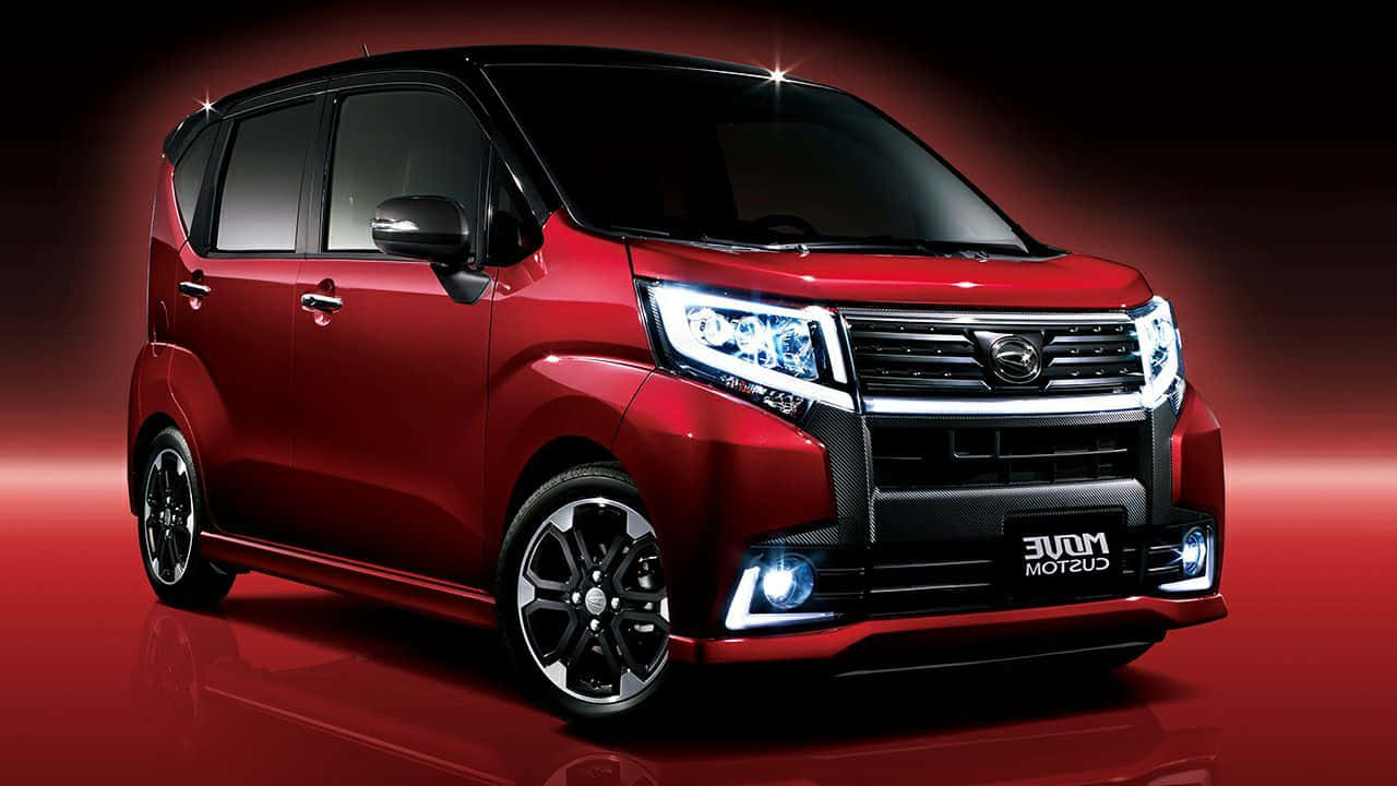 Daihatsu Compact Car In Action Wallpaper