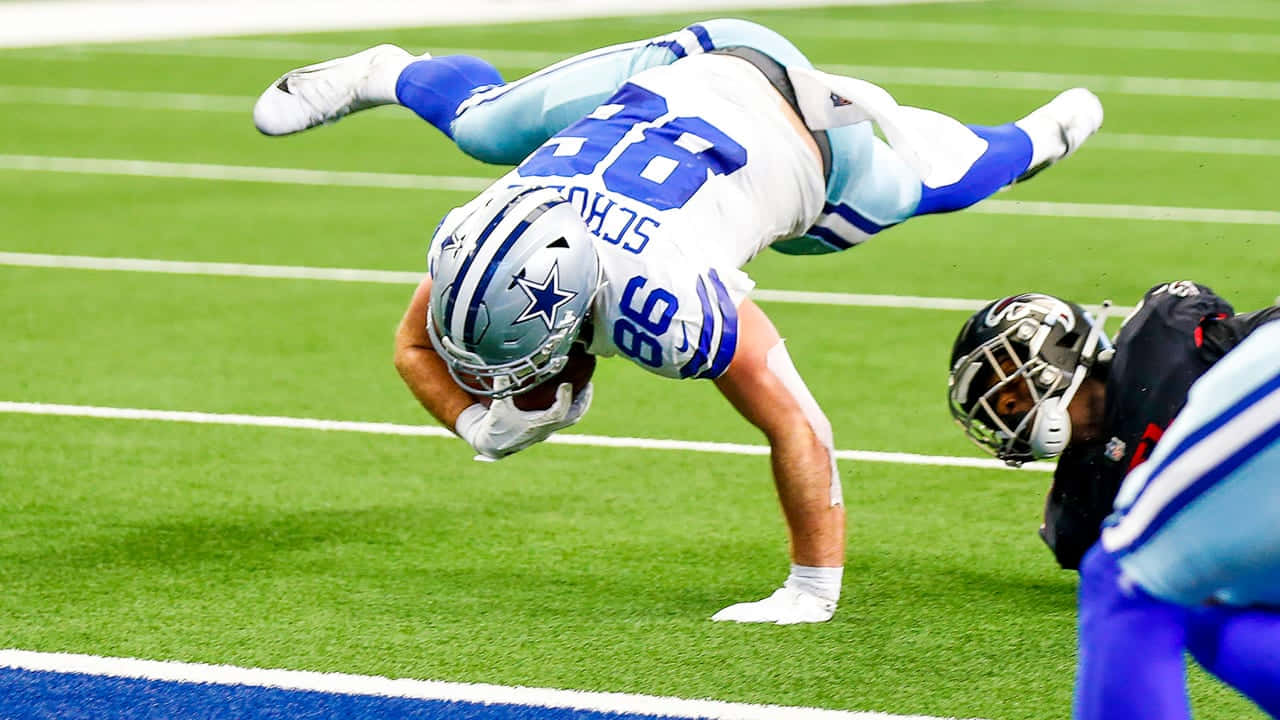 Dalton Schultz Athletic Catch Dallas Cowboys Wallpaper