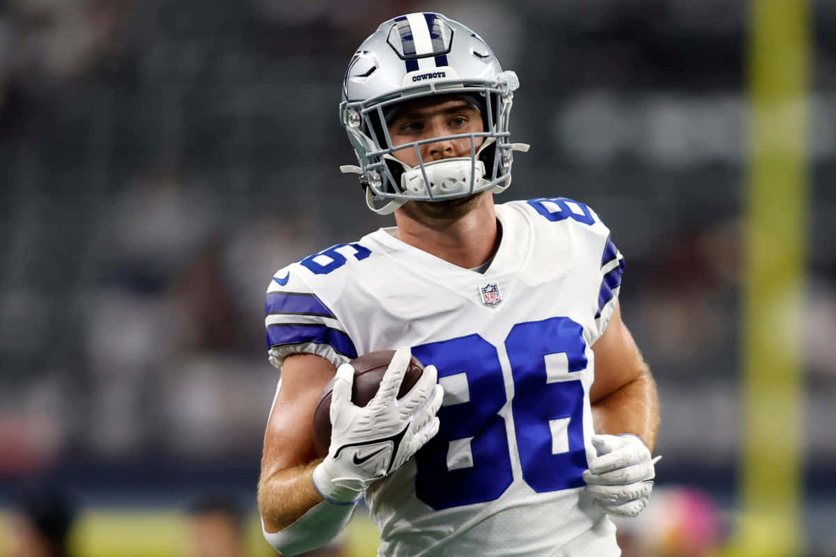 Dalton Schultz Dallas Cowboys Game Action Wallpaper