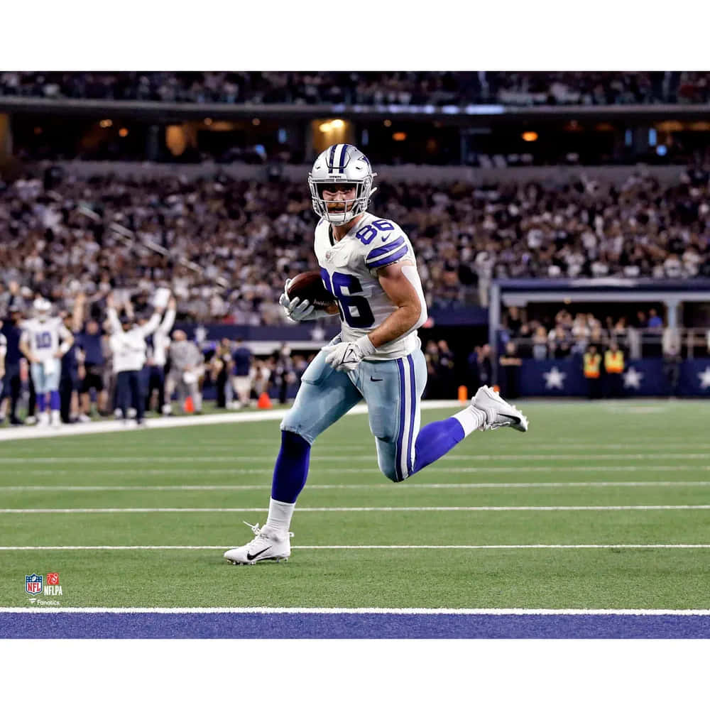 Dalton Schultz In Action Dallas Cowboys Wallpaper