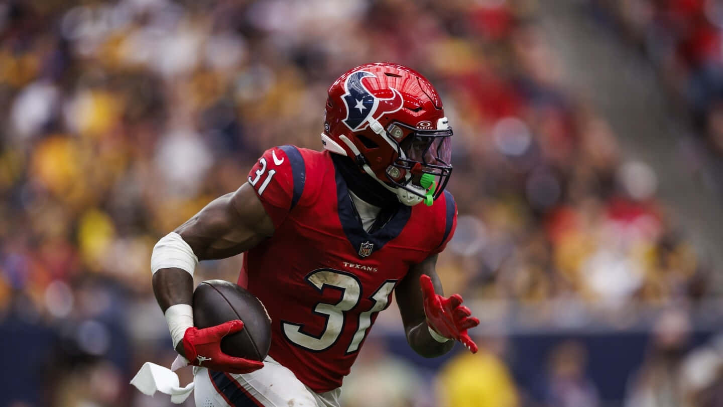 Dameon Pierce Houston Texans Running Back Action Wallpaper