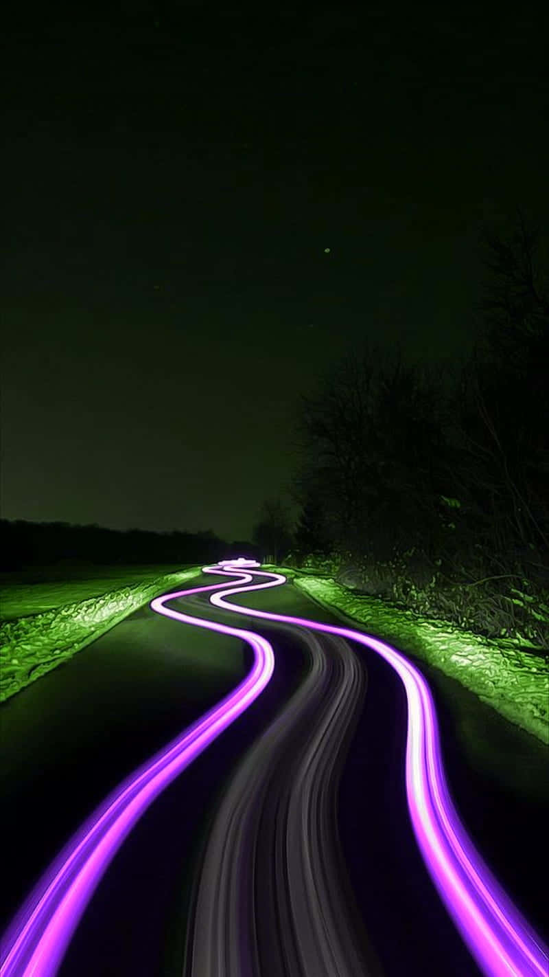 Dancing Abstract Lines Of Neon Green And Purple Wallpaper