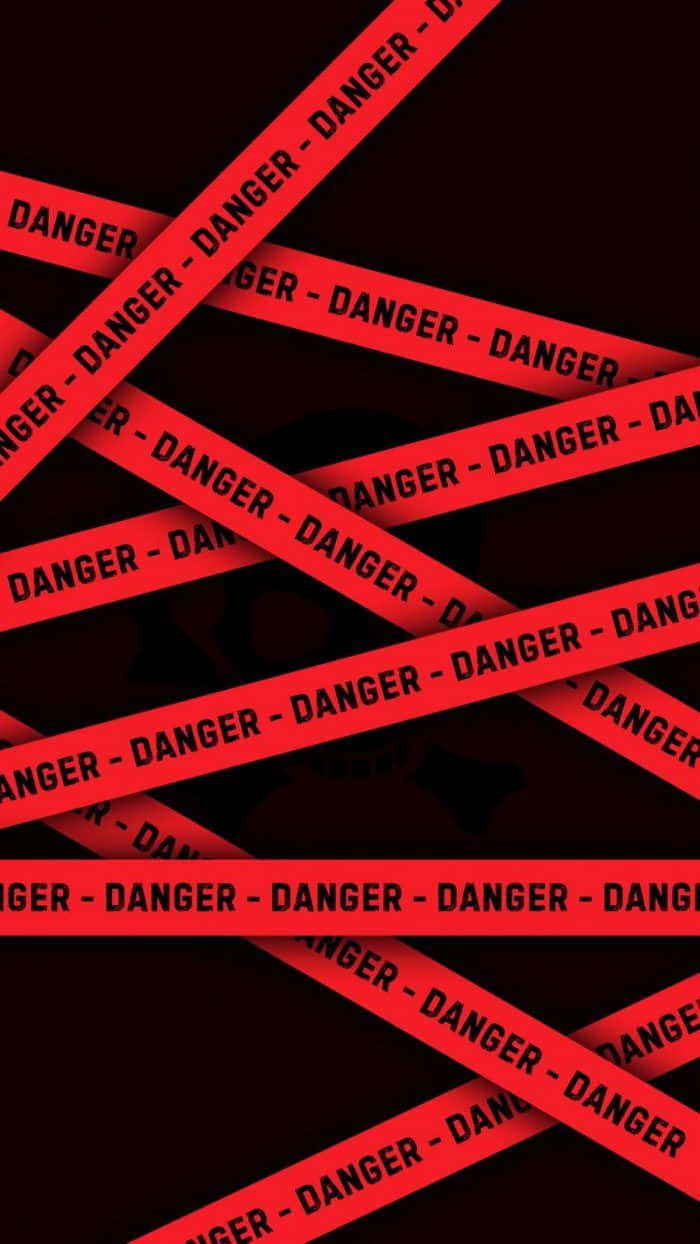 Danger Tape On Black Background Wallpaper