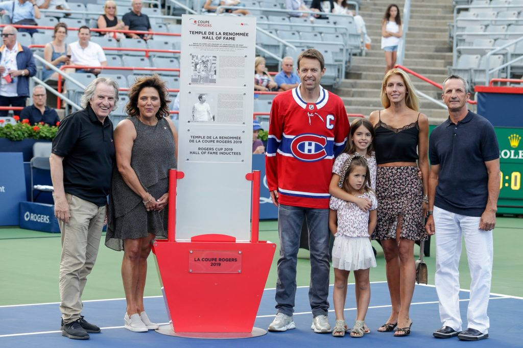 Daniel Nestor And Family Enjoying A Day Out Wallpaper